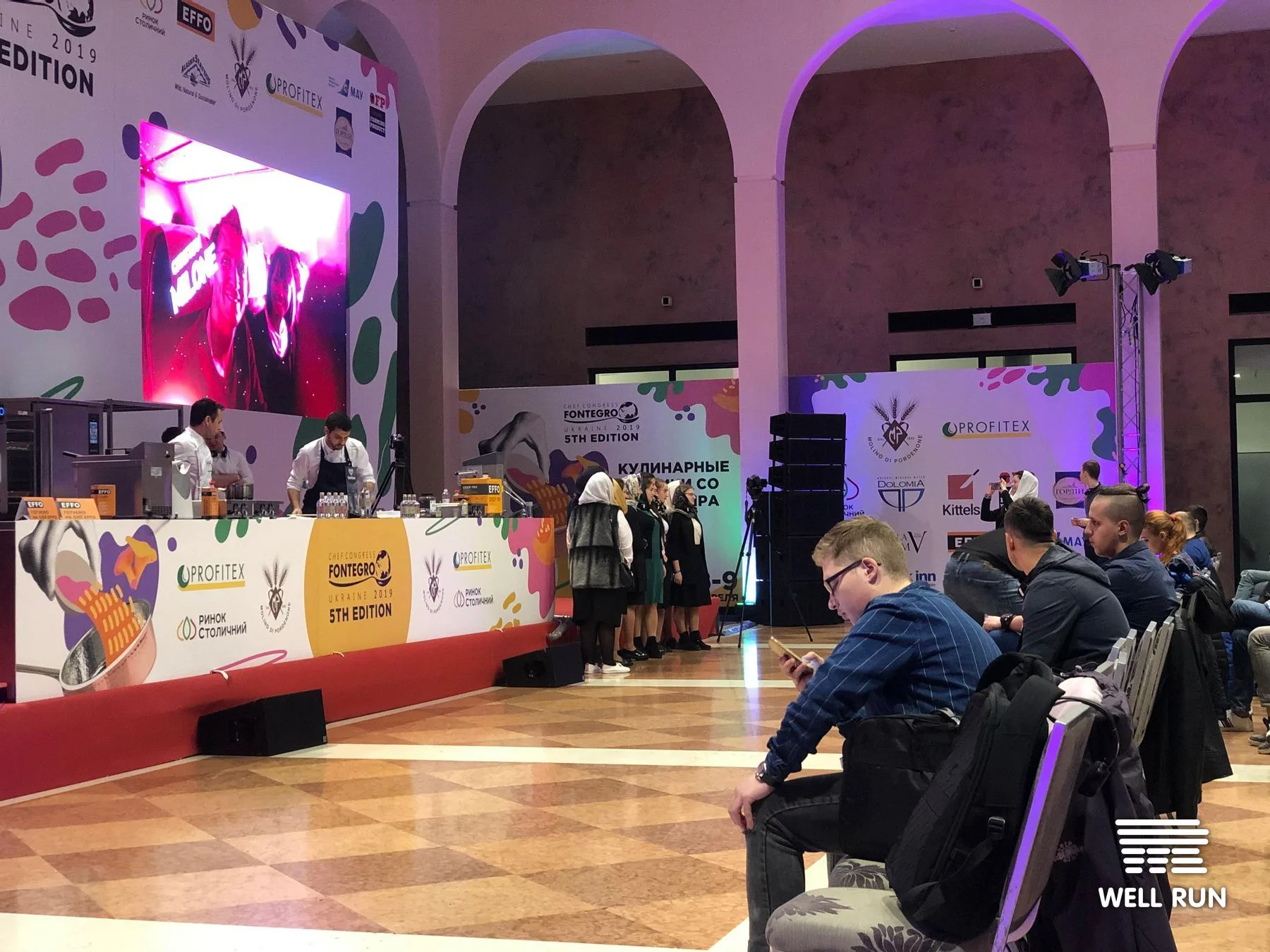 Chefs demonstrate on stage at Fontegro Ukraine 2019, Olimpiyskiy Event Hall, Kyiv, with live LED feed
