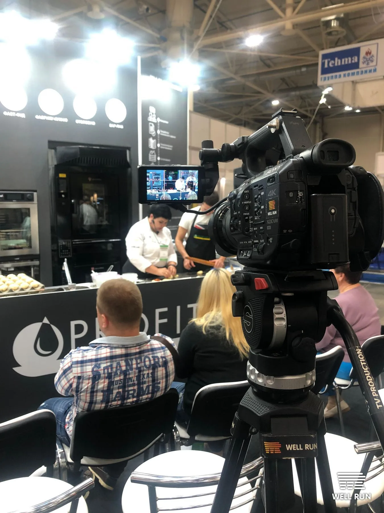 Well Run 4K camera on tripod filming chefs at Profitex stand, FoReCH expo 2019
