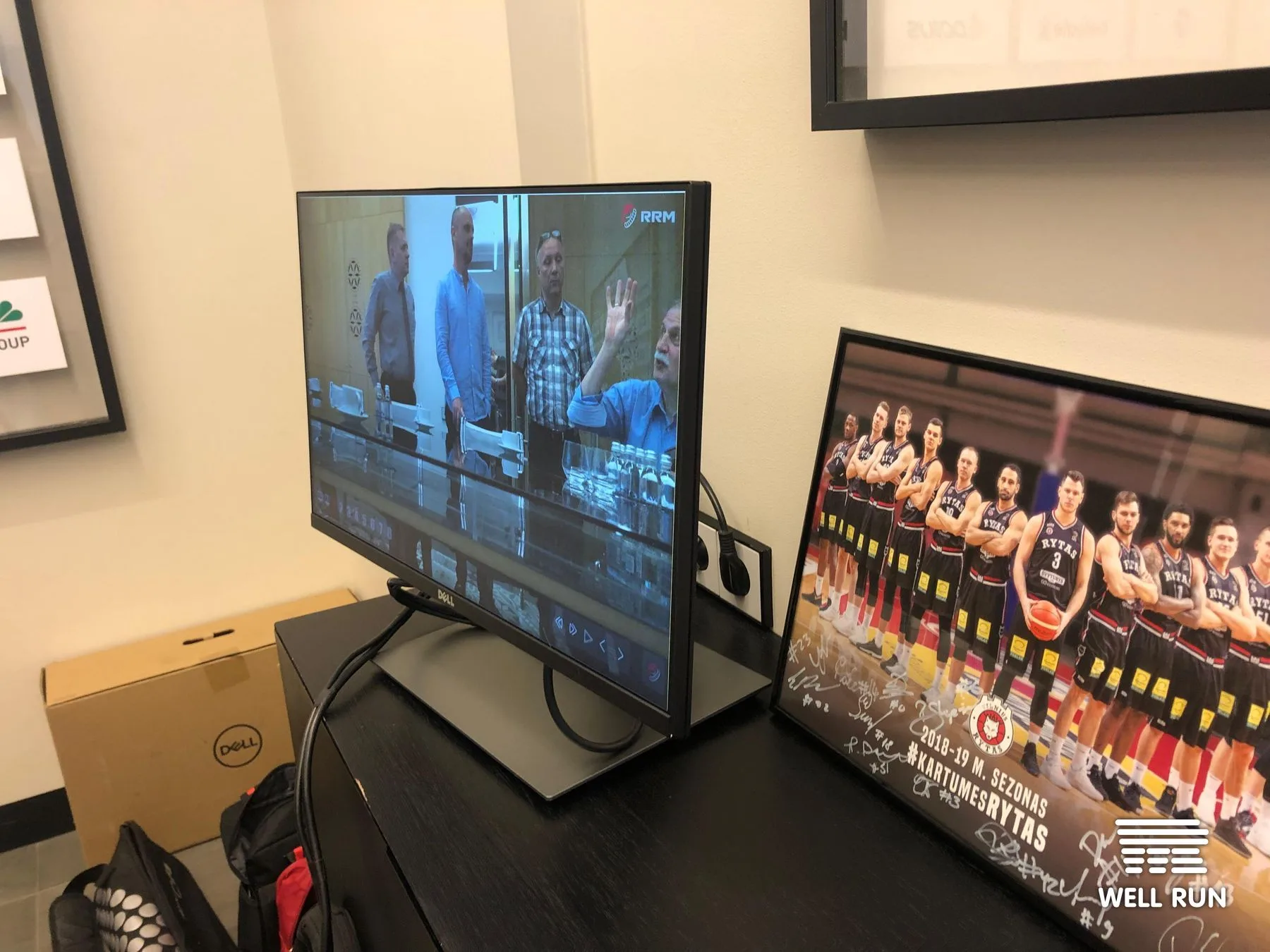 Monitor displaying RRM multi-angle replay interface during LKL headquarters demonstration, Vilnius