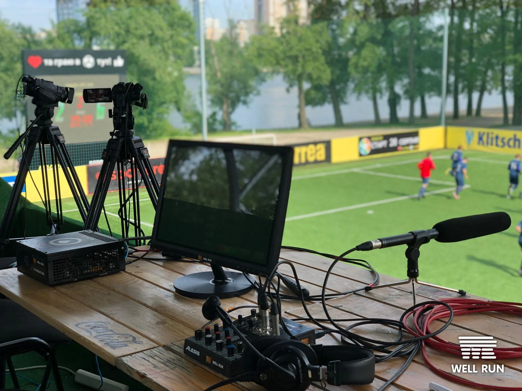 APEX OS production hardware, monitor, audio mixer, shotgun mic and cameras at Hydropark Arena pitch-side — frame 6